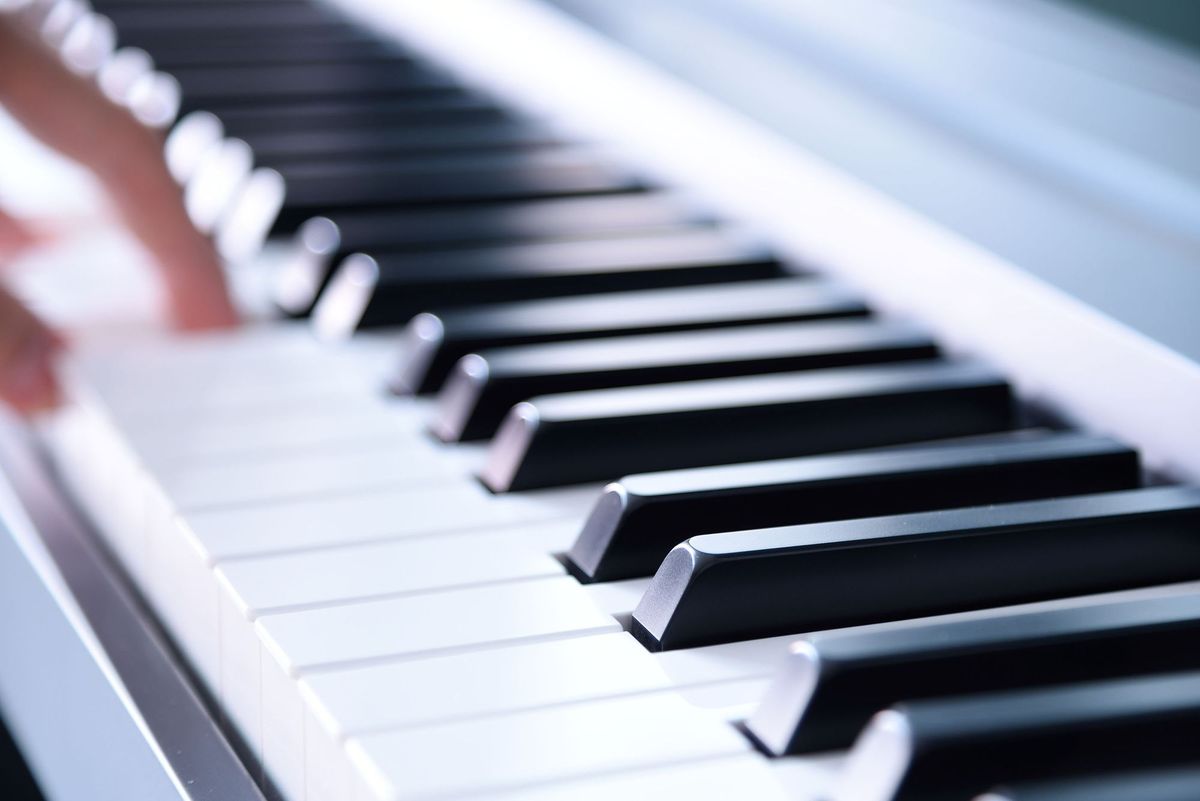 Sunrise Piano logo