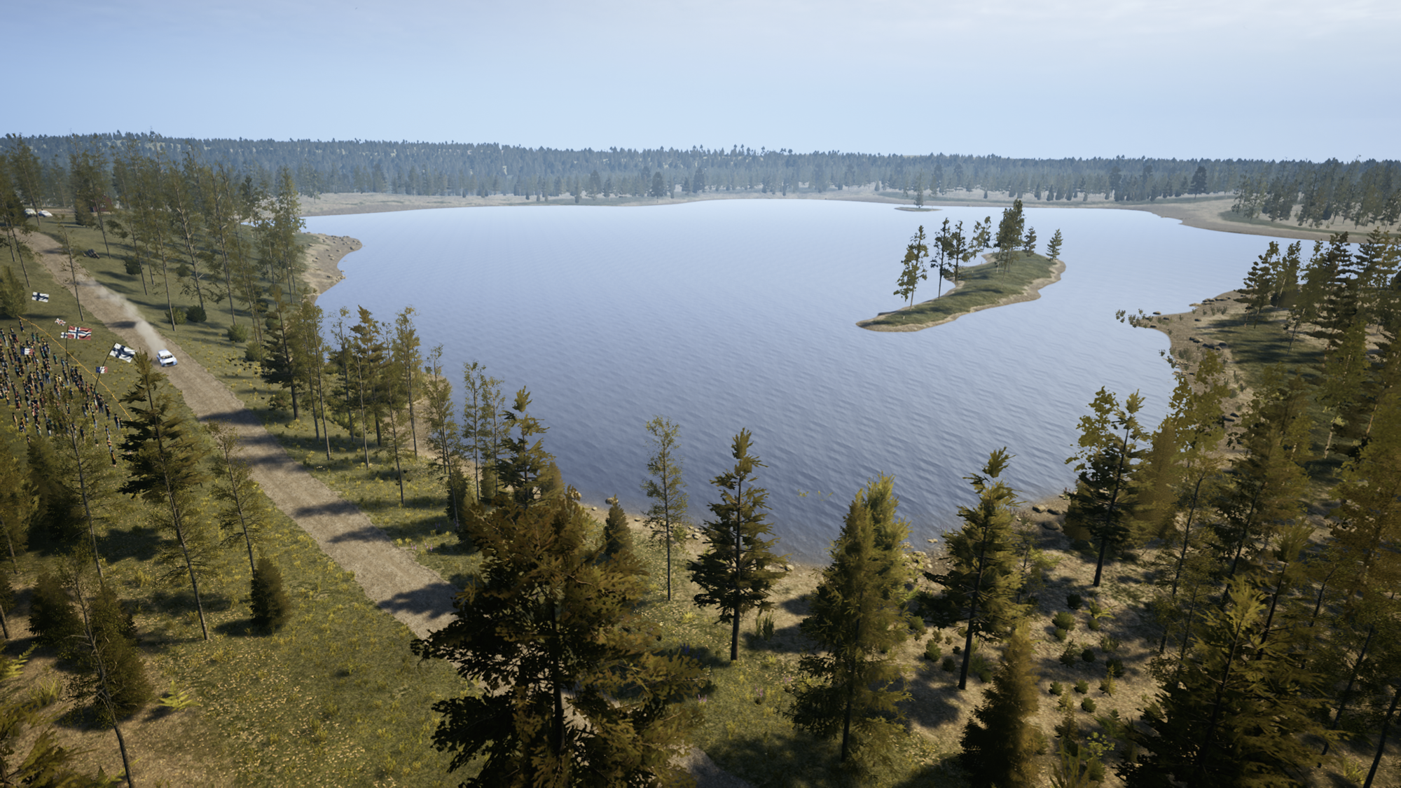 A scenic view of a lake with a small island on it, with a gravel road alongside the shore of the lake.