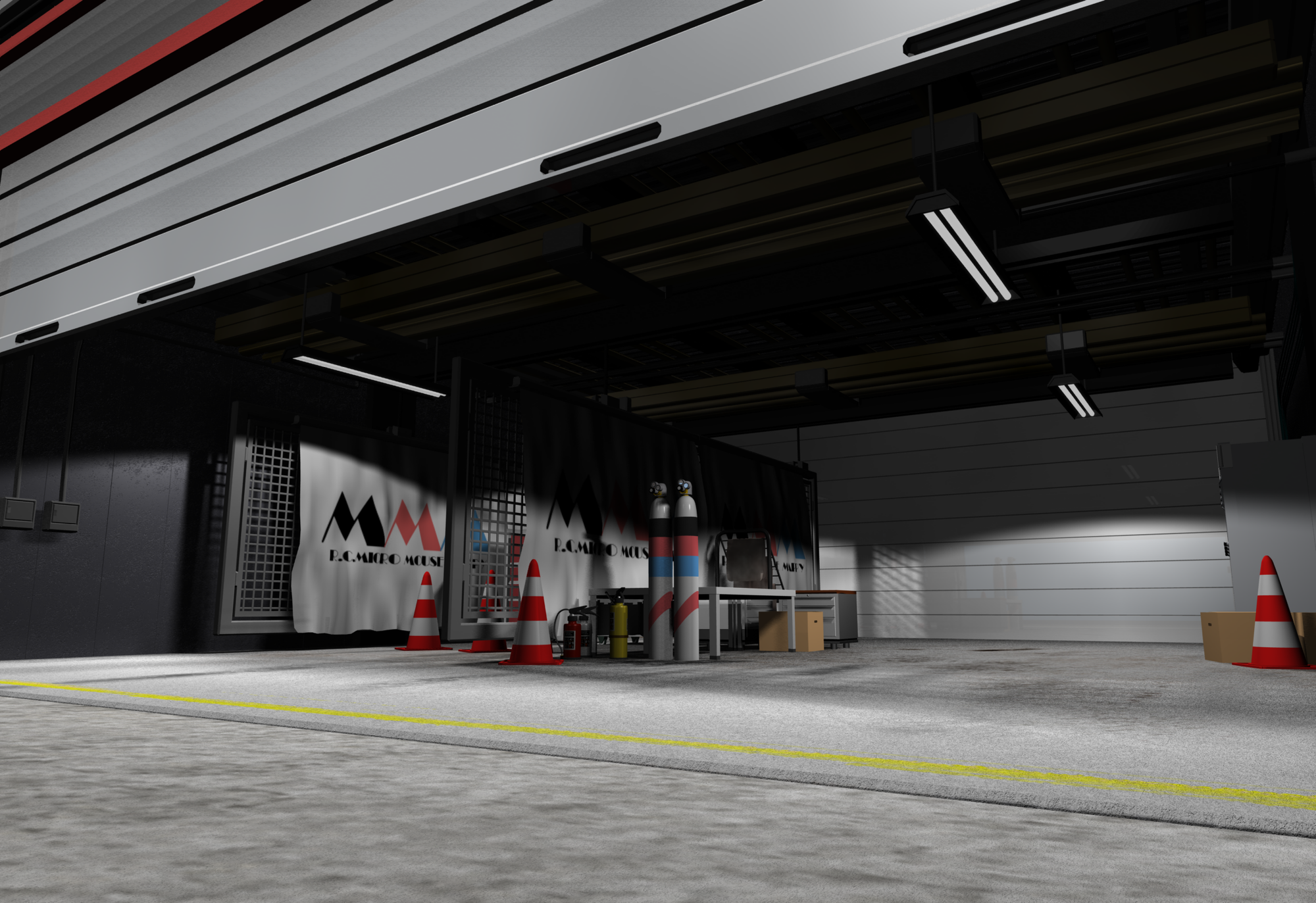 A pre-rendered CG image of a Micro Mouse Mappy garage area at a race track. The white MMM banners are visible on the side of the garage, with some orange and white cones strewn about the area.