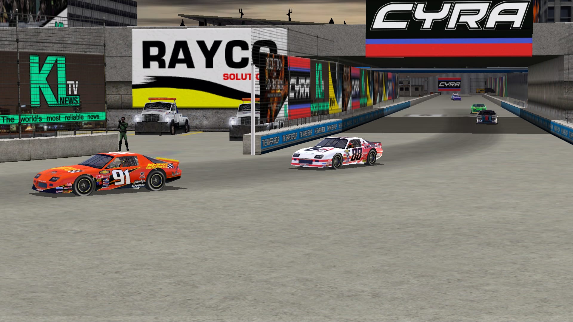 A pair of late-80s Chevrolet Camaro stock cars go through a corner in a grimy industrial estate that's covered in billboards and banners. Also there's a military police guy hanging out as a corner worker. It's from the Gravis City Zone 7 track that was made for NASCAR Racing 2003 by Cynon44.