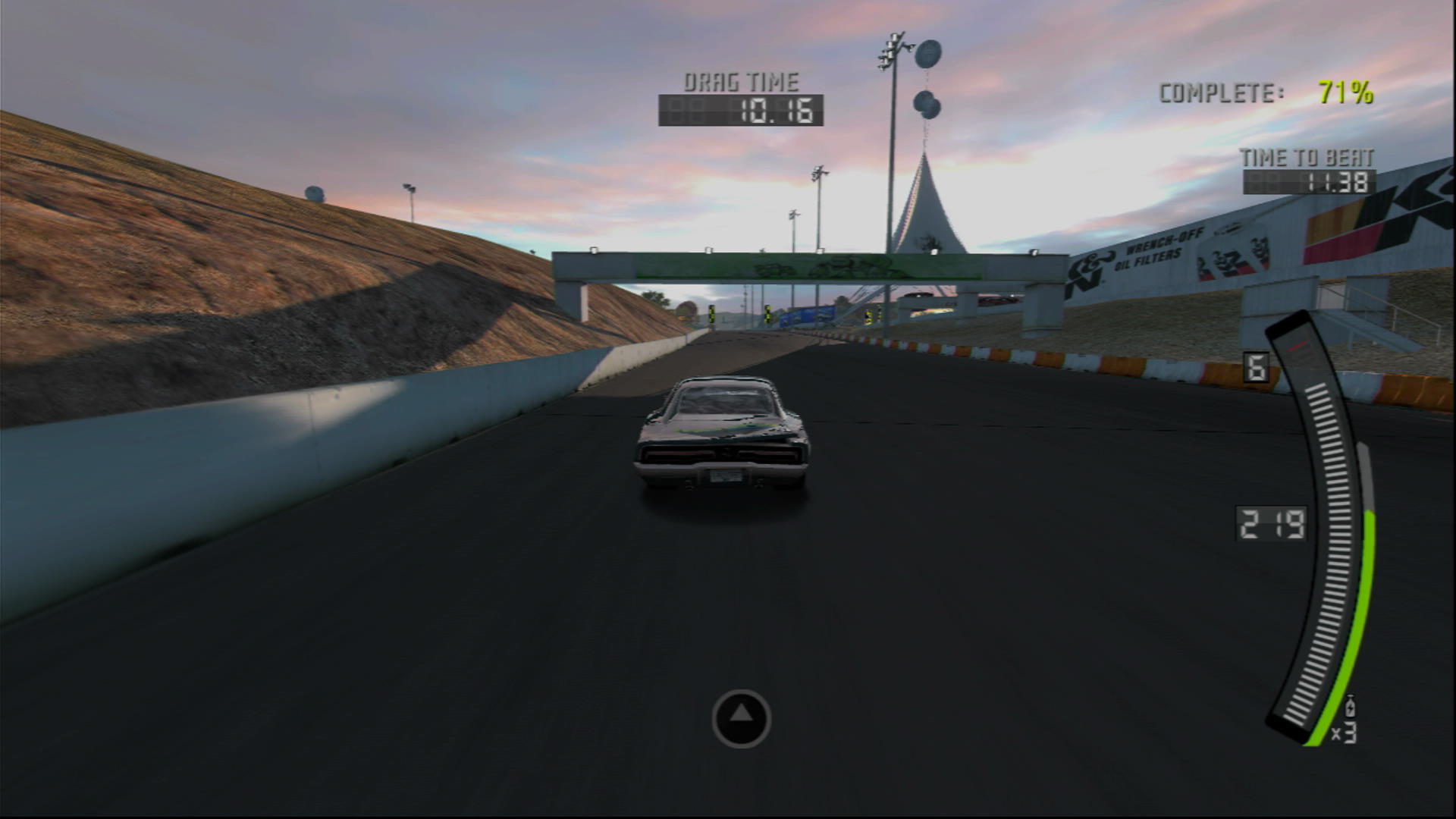 Gameplay of a drag race at Sonoma Raceway in Need For Speed Pro Street. The late 60s Dodge Challenger is doing 219 mph as it flies up the hill to the end of a half mile drag race.