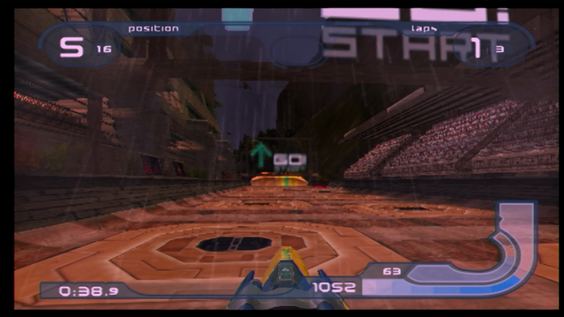 The end of the first lap of a race in Wipeout Fusion, using the blue and yellow FEISAR craft at Alca Vexus.