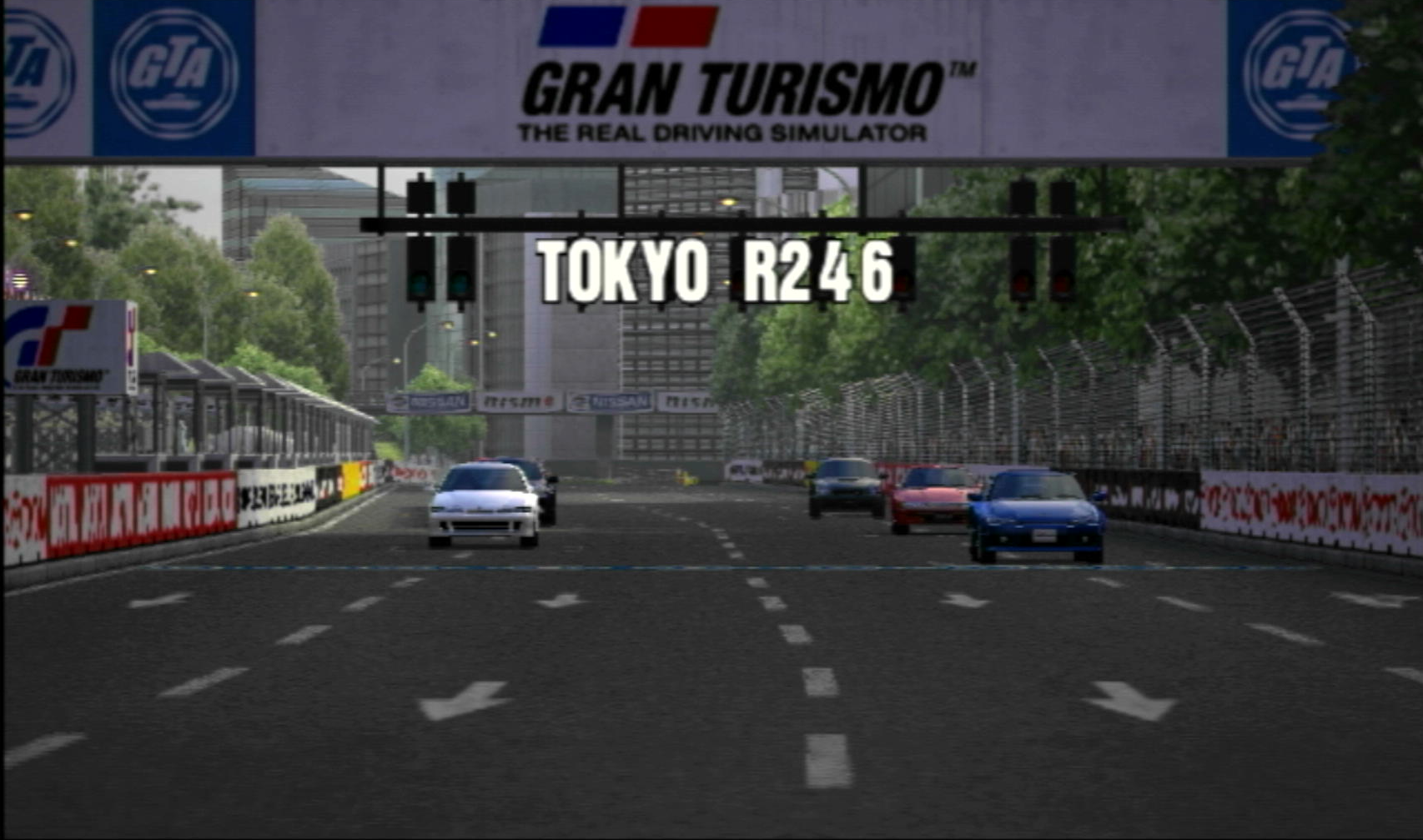 The standing start of a race at Tokyo R246, looking at the three rows of two cars on the grid.