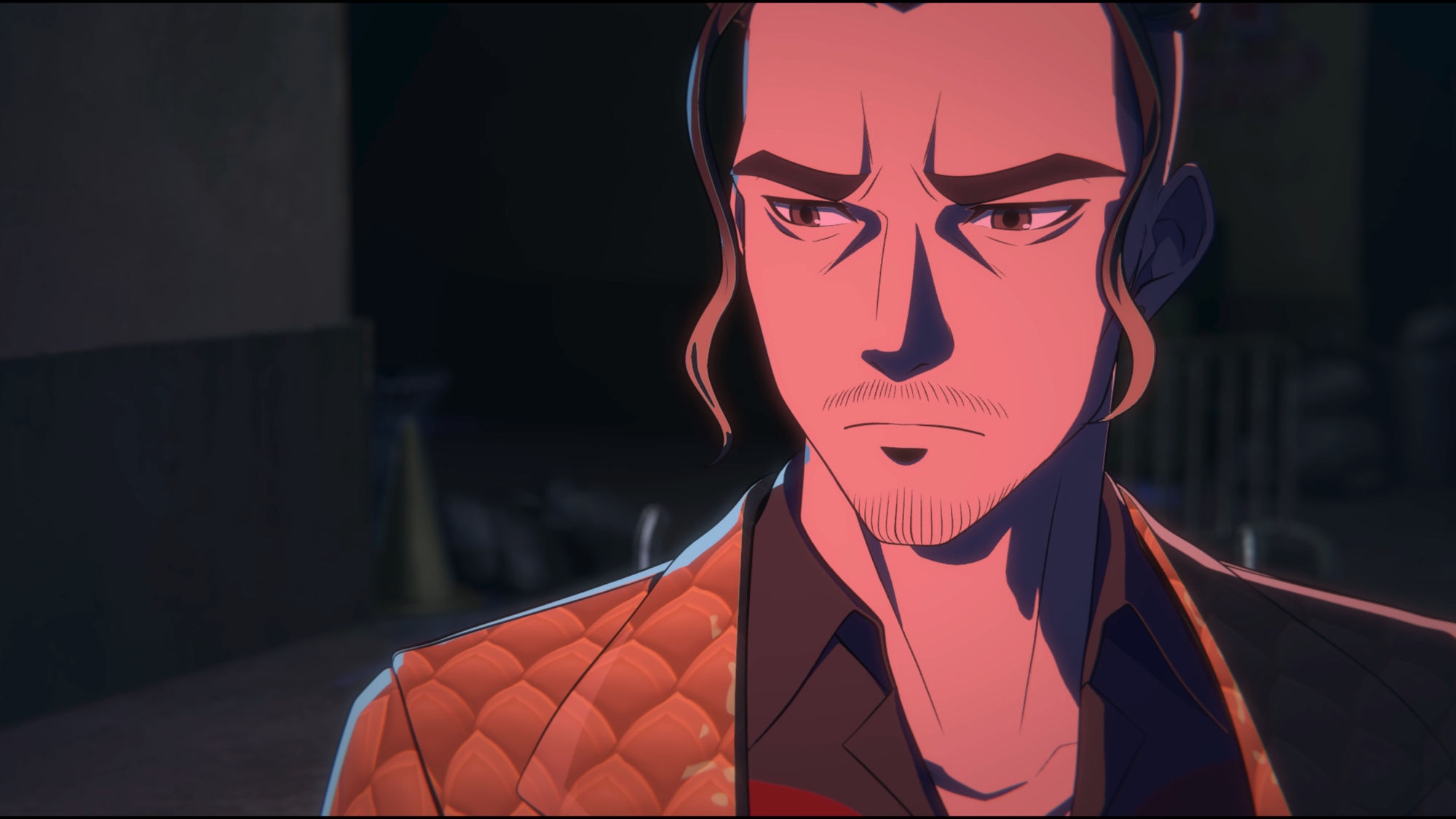 Noboru Sato, a fella that's a part of the yakuza, looks forlorn at something out of shot. The goatee looks good on him.