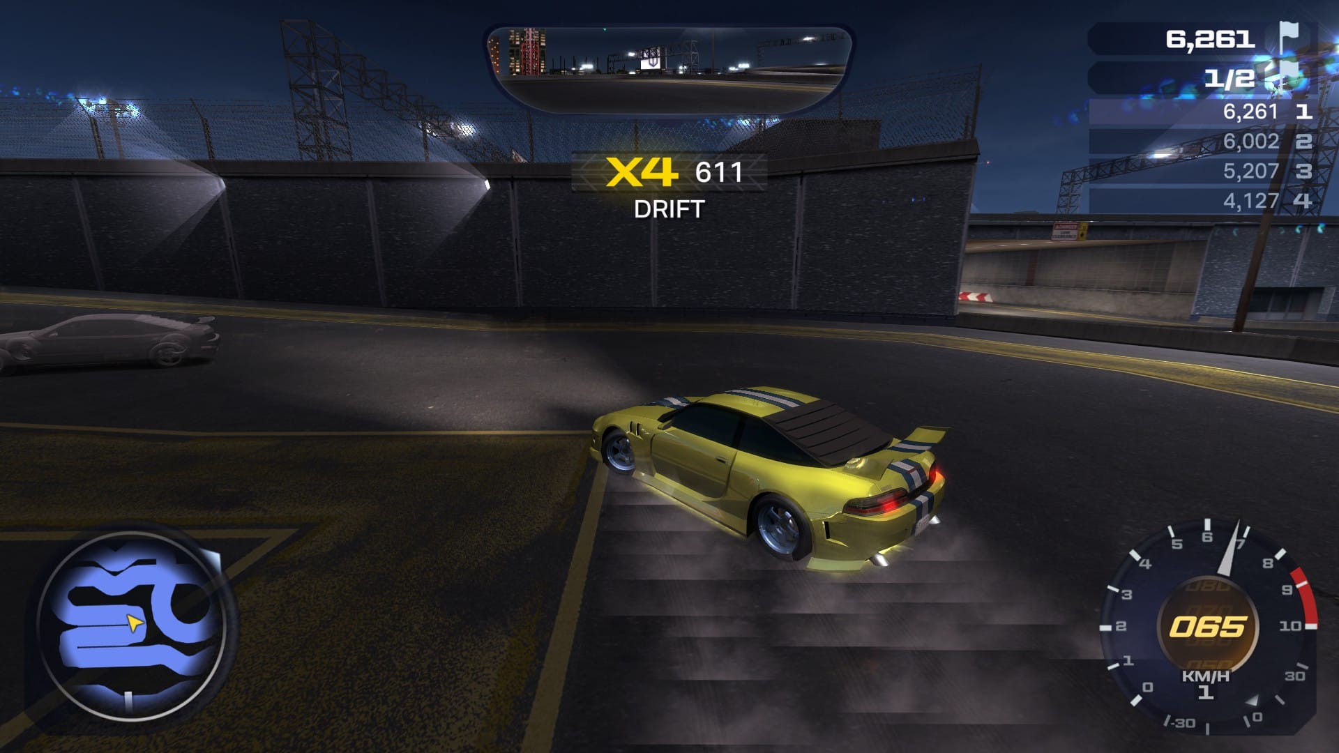 Drifting around a tight squared hairpin in the Heatwarped demo. The chase camera hasn't followed the car enough around the corner, preventing from seeing what is going on ahead on the track if you don't look at the track map.