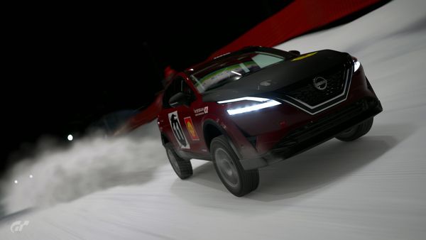 A Nissan Qashqai suv going over a jump at the Lake Louise snow track in Gran Turismo 7.