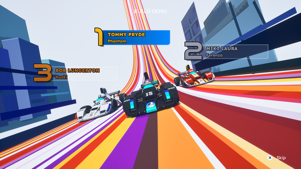 The podium highlight screen from Formula Legends, showing three cars driving down a multi-colored road with buildings flanking the road.