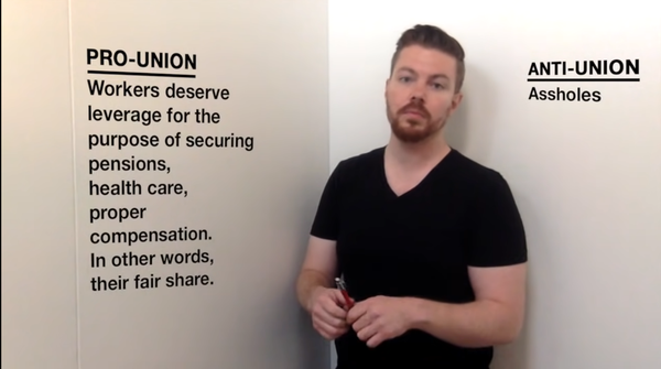 Jon Bois is standing by a corner wall, with some text showing the cases for being Pro and Anti Union. The case for anti-union is that you're an asshole.