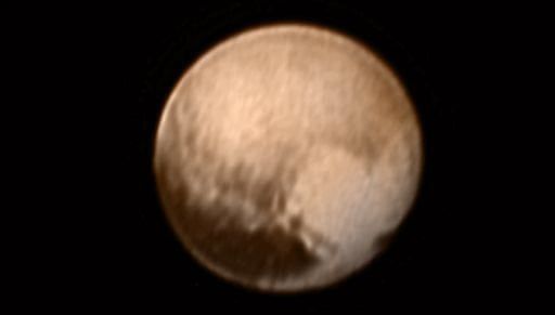 Pluto close-up: Spacecraft makes flyby of icy, mystery world