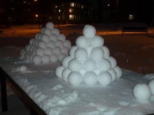 What Is This Boy Throwing A Snowball At?