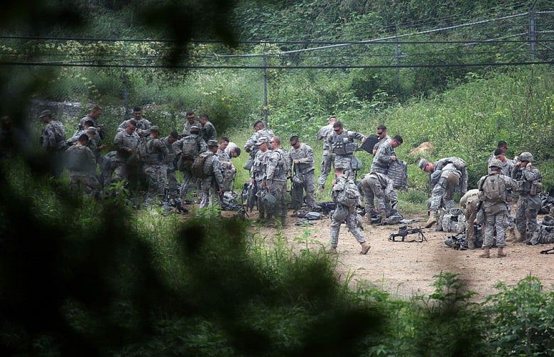 North Korea warns of war with South after artillery fire