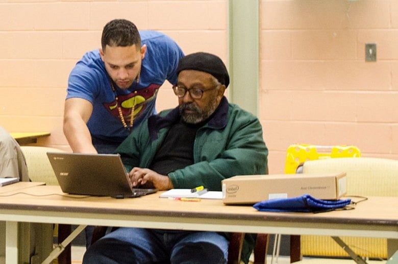 Computer trainers help Boston baby boomers reach Internet speed