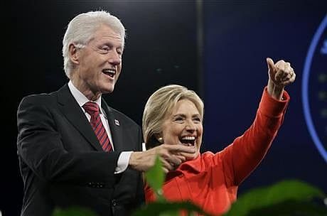 Clintons rake in millions from Wall Street