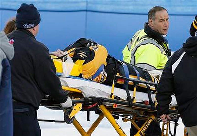 Mass. hockey player in high spirits despite paralysis from Winter Classic crash