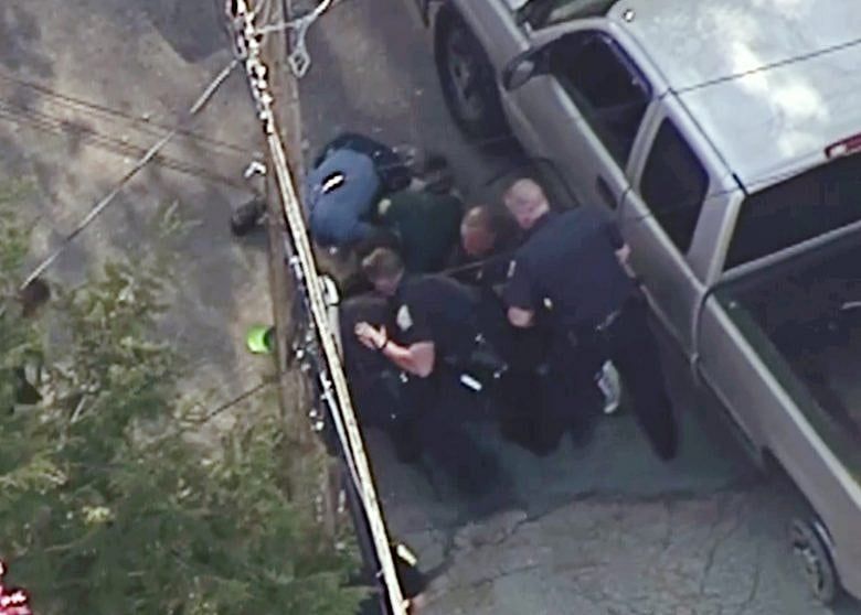 Troopers suspended over pursuit video that shows beating