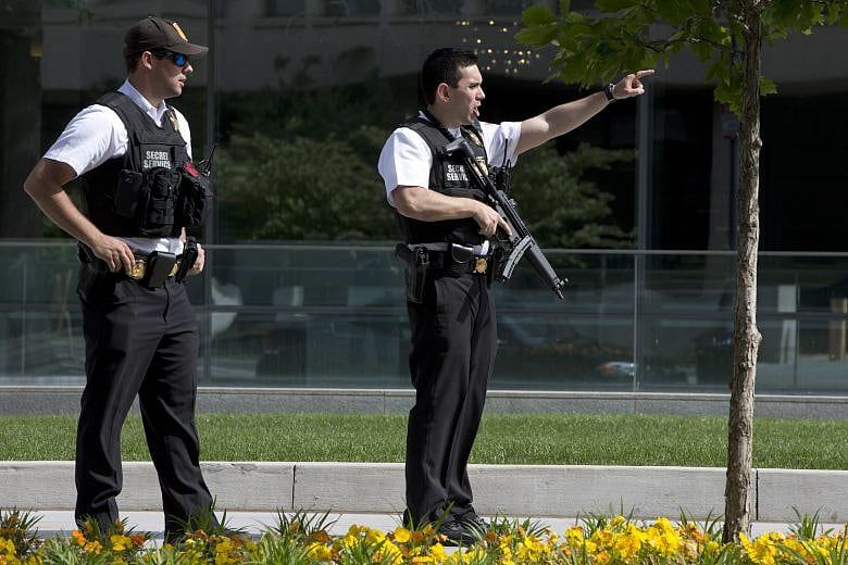 Armed man shot down outside White House