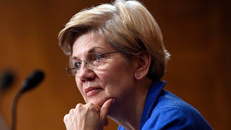 Warren fires shots at DNC, Washington think tanks