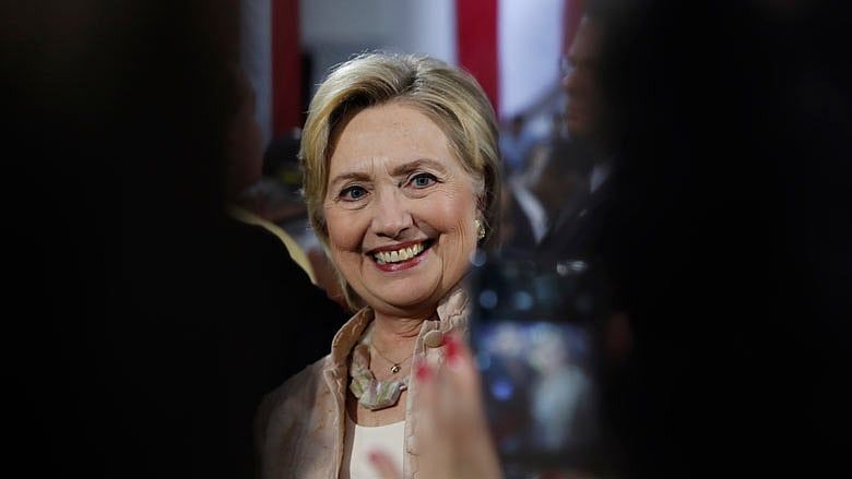 Clinton lead slims in latest poll