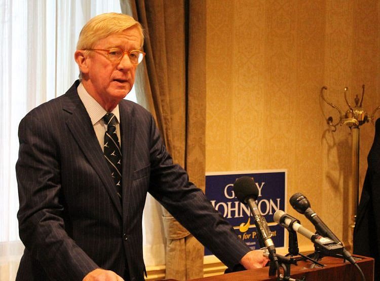 Weld urges support for Clinton in voters are not with Libertarians