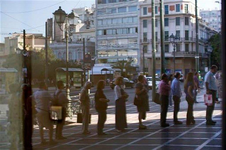 Greece seeks 3-year aid program, rushes to detail reforms