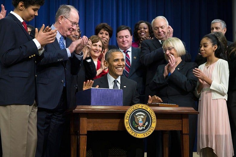 Obama signs education law rewrite shifting power to states