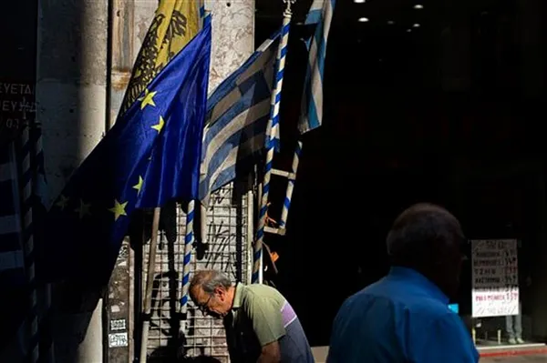 Greek banks to reopen after cash pledge from lenders