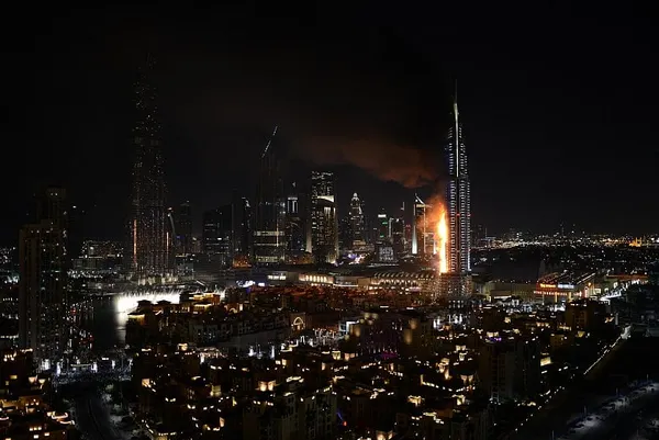 Dubai tower in flames doesn’t deter fireworks