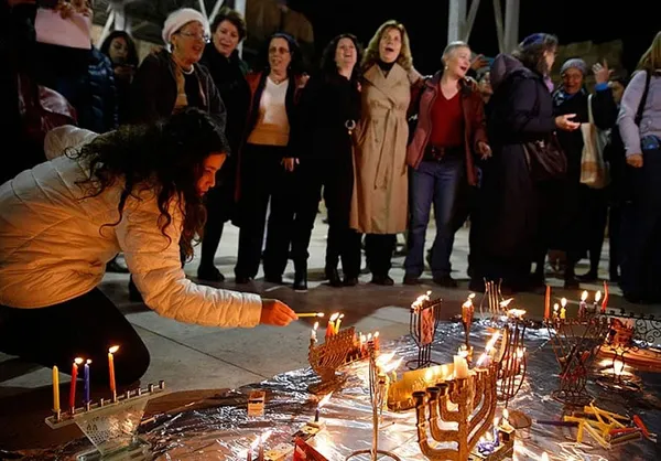 Let women light Hanukkah candles at Western Wall, Israeli official says