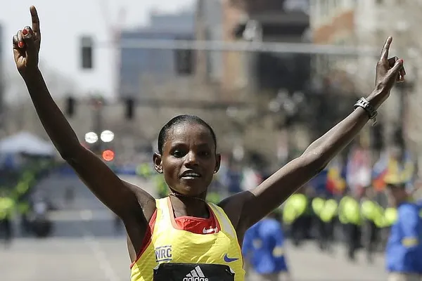 Boston Marathon women’s winner gives trophy to Gibb