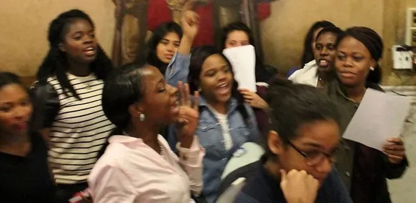 Youthful protest over job funding disrupts budget debate