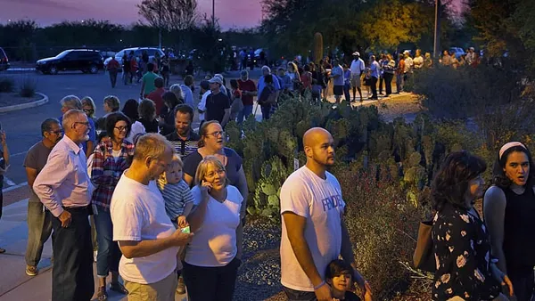 Pizza and long lines: Arizona voters waited into wee hours