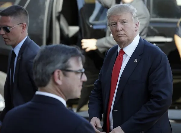 Defiant Trump dismisses GOP critics before Ryan meeting