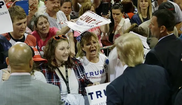 Trump scorns Republican foes, laces into Clinton, Warren