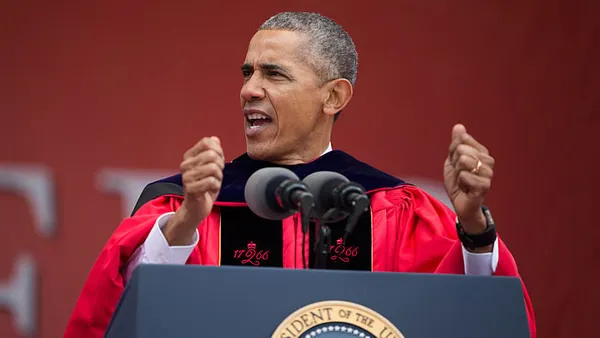 Rebuking Trump, Obama tells graduates walls won’t solve ills