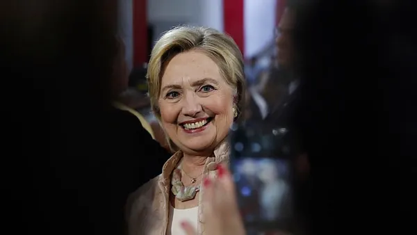 Clinton lead slims in latest poll