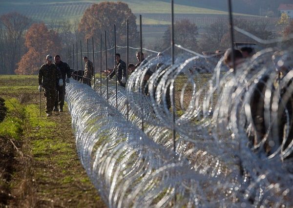 Slovenia starts building migrant fence at border to Croatia