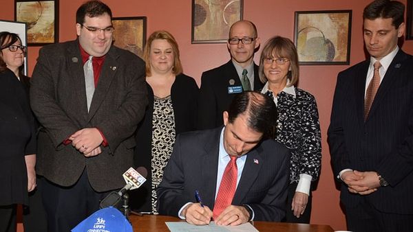 Wisconsin Gov. Scott Walker signs bills reducing Planned Parenthood funding