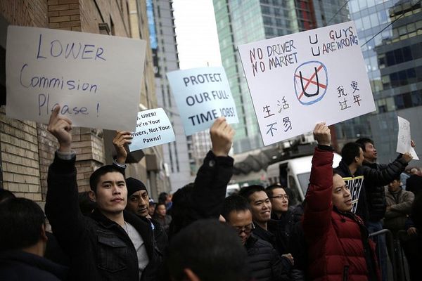 Uber drivers in NYC protest 15% fare cut
