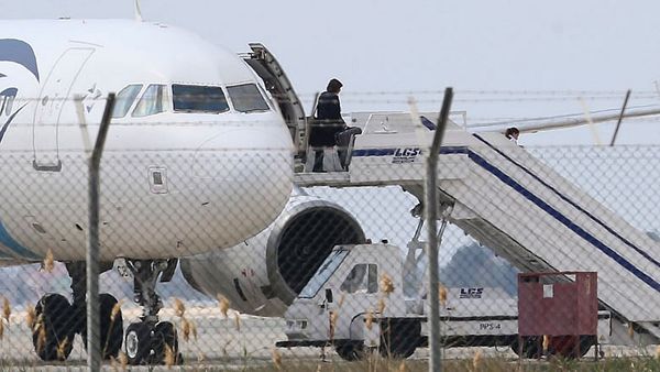 Egypt plane drama ends: hijacker arrested, passengers freed