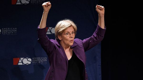 Warren on attack against Trump as she gets behind Clinton