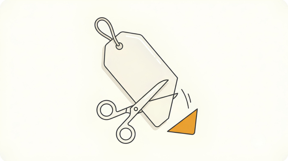 A plain price tag with one corner being cut off by scissors, showing the Etsy Offsite Ads cut on a print on demand sale