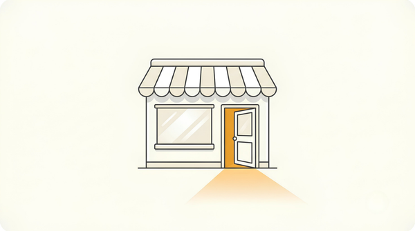 A small shop front with its door open again and warm light spilling out, an Etsy shop suspended and then reinstated