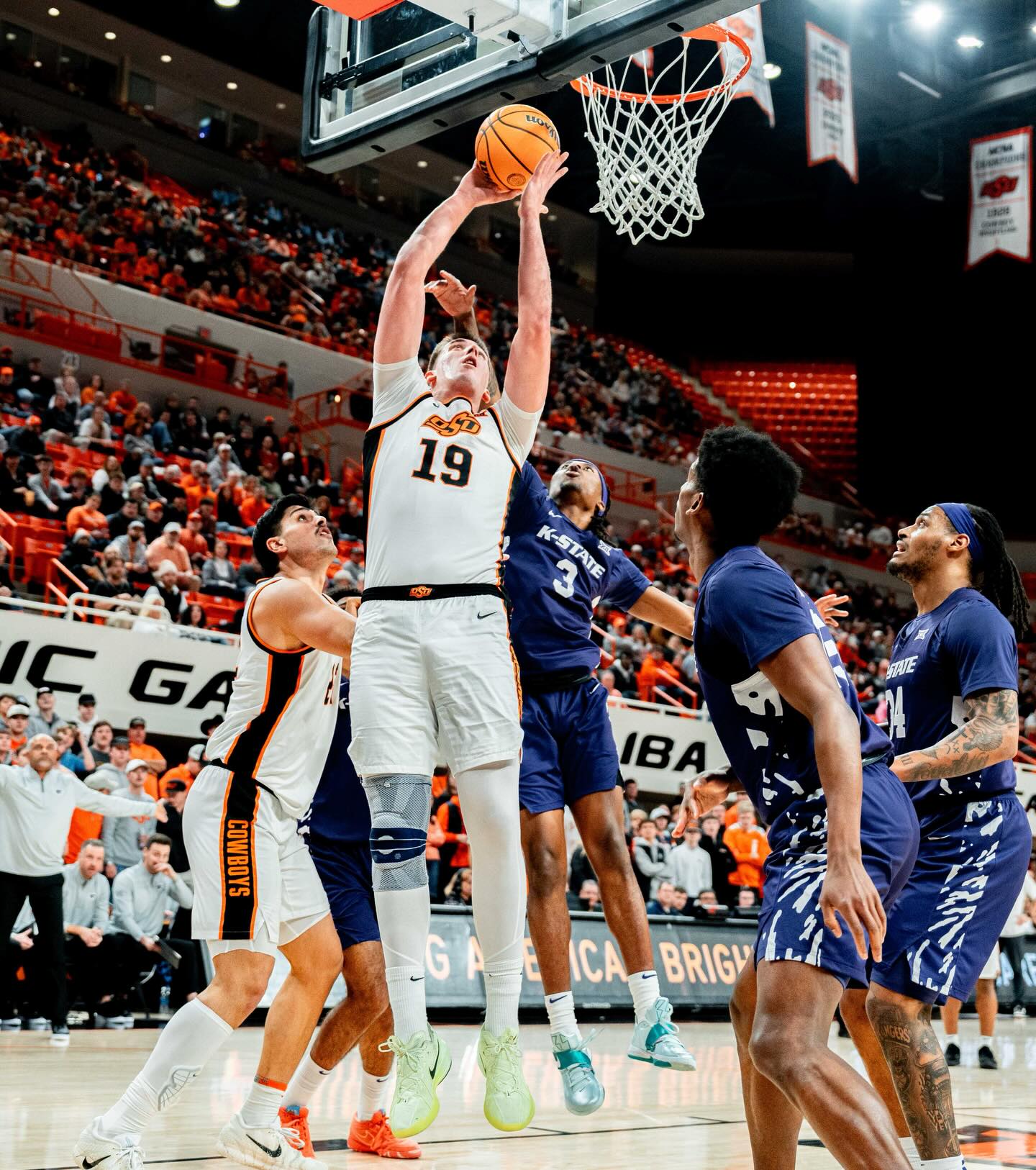 OSU's Andrija Vukovic elevates for a shot against Kansas State defenders at Gallagher-Iba Arena during the Cowboys' one-point conference win Saturday