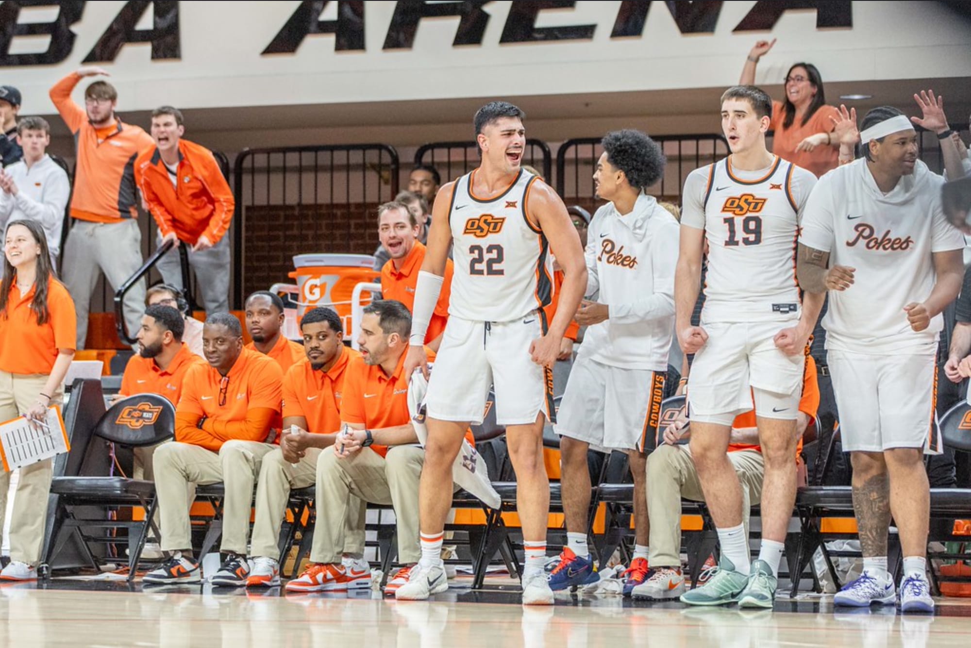 Oklahoma State center Parsa Fallah (22) and teammates react from the bench during the Cowboys' game against Sam Houston Dec. 2, 2025 at Gallagher-Iba Arena in Stillwater, Oklahoma. 