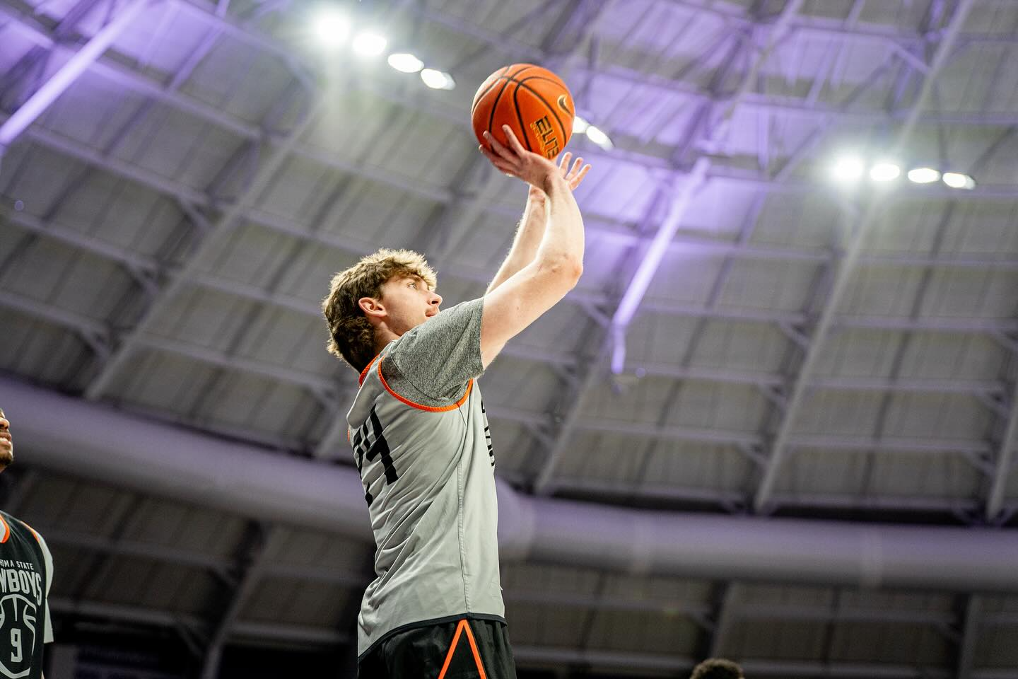 Oklahoma State freshman Ryan Crotty (24) shoots during warmups before the Cowboys' game at TCU on Jan. 19, 2026.