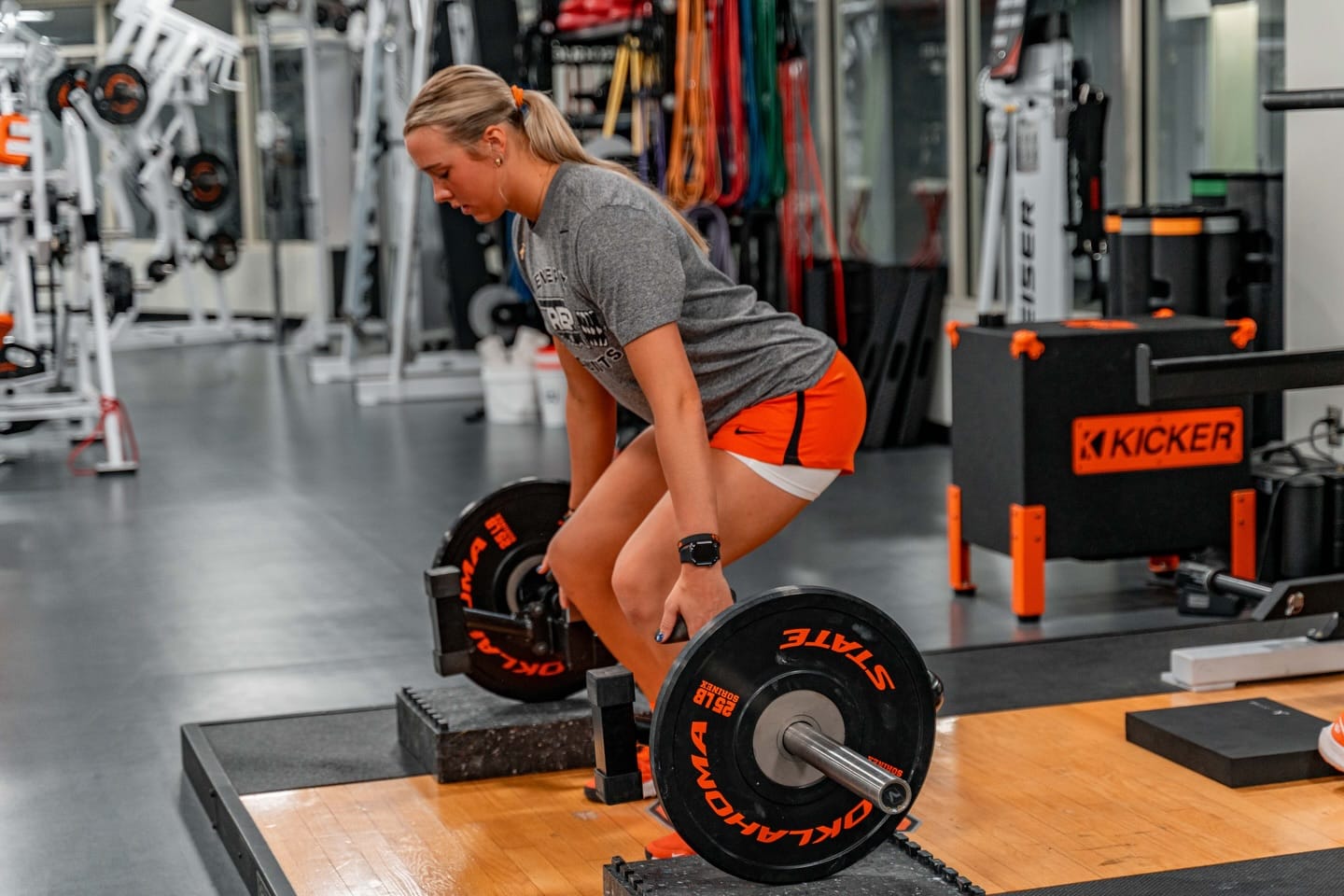 Oklahoma State freshman Aubrey Jones performs a deadlift during a preseason workout. The Michigan native is one of the nation's top recruits joining the Cowgirls for the 2026 season.