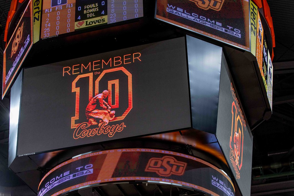 Gallagher-Iba Arena scoreboard shows Remember the Ten logo with Cowboys mascot and orange branding during OSU's game against Colorado on Jan. 18, 2025, in Stillwater, OK.