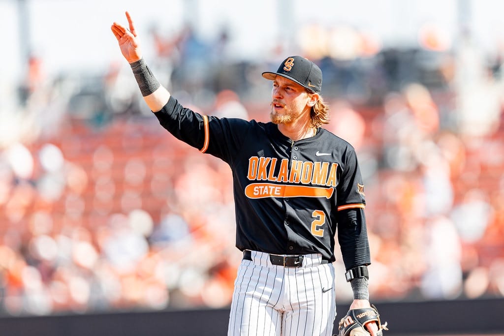 Oklahoma State third baseman Aidan Meola holds up two fingers during a game against Sam Houston State on Feb. 28, 2026, at O'Brate Stadium in Stillwater.