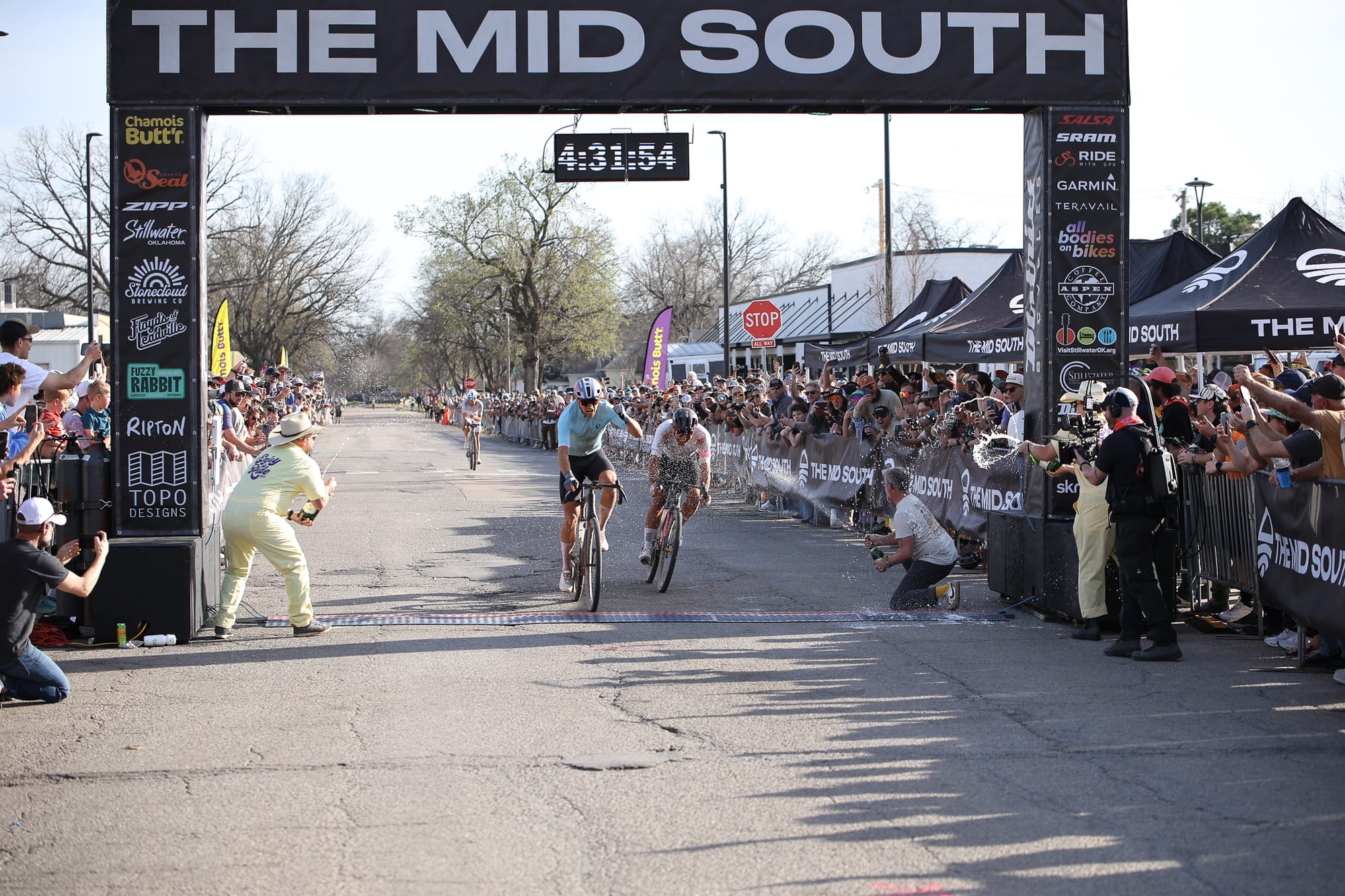 Cobe Freeburn edges Cameron Jones at the finish line at Block 34 in Stillwater to win the men's pro race at the 2026 Mid South on Friday, March 13, 2026, in 4:31:54.