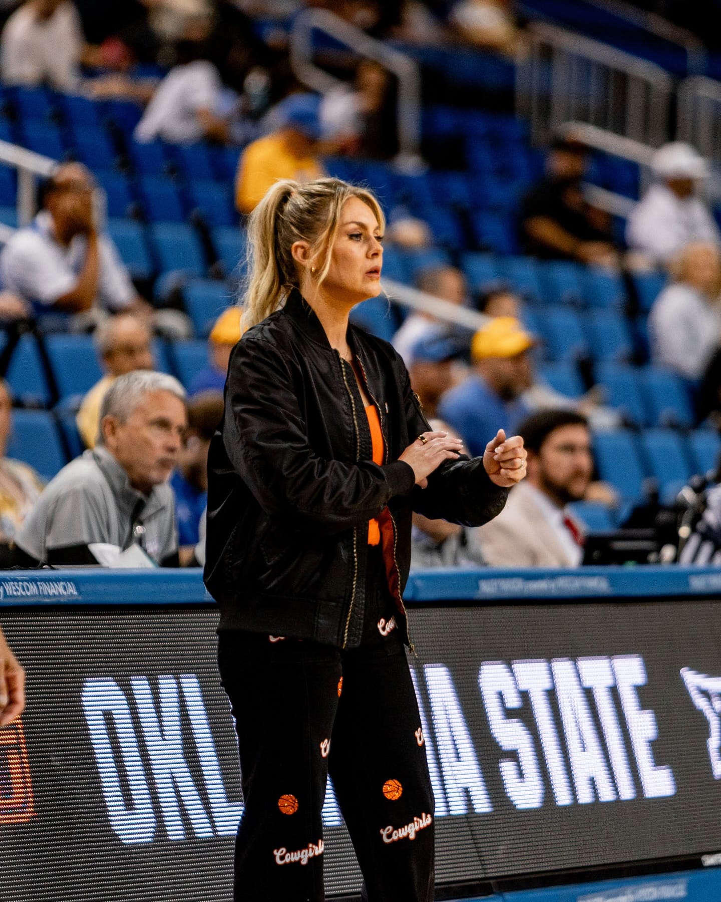 OSU head coach Jacie Hoyt looks on from the sideline during the Cowgirls' 82-68 NCAA Tournament first-round win over Princeton at Pauley Pavilion in Los Angeles.